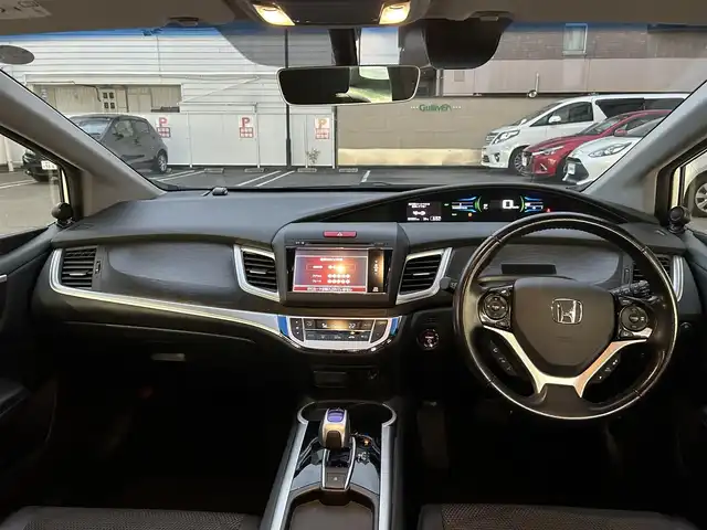 ホンダ ジェイド ハイブリッド X 高知県 2015(平27)年 8.3万km ホワイトオーキッドパール 純正ナビ /【Bluetooth　CD DVD TV USB 】/バックカメラ /クルーズコントロール　/レーンキープアシスト　/衝突被害軽減システム　/カーテンエアバック　/ビルトインETC　/プッシュスタート　/スペアキー/純正アルミホイール/純正フロアマット/取扱説明書