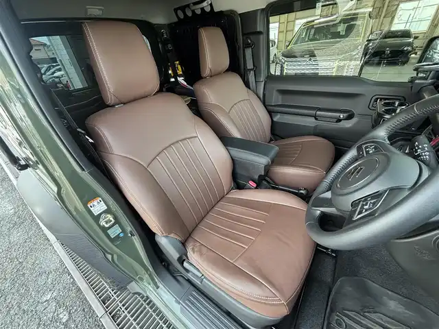 スズキ ジムニー シエラ JC 東京都 2020(令2)年 4.5万km ジャングルグリーン ４ＷＤ/セーフティサポート（予防安全技術）/アルパインナビ/バックカメラ/クルーズコントロール/ドライブレコーダー/ヒルディセントコントロール/LEDヘッドランプ/オートライト/ヘッドランプウォッシャー/ブラックドアミラー（電動オート格納機能/ヒーター/ウィンカー付）/ボディ同色アウトサイドドアハンドル/プライバシーガラス/アナログメーター/ホワイト照明マルチインフォメーションディスプレイ/革巻きステアリングホイール/ステアリングスイッチ/SRSエアバック  （運転席/助手席）/バニティミラー（運転席/助手席）/撥水加工ファブリックシート/シートヒーター（運転席/助手席）/キーレスプッシュスタートシステム/タクティカルＲバンパー/ナンバー移動キット/オーバーフェンダープロテクター/ヒッチキャリア/ルーフキャリア