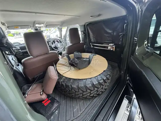 スズキ ジムニー シエラ JC 東京都 2020(令2)年 4.5万km ジャングルグリーン ４ＷＤ/セーフティサポート（予防安全技術）/アルパインナビ/バックカメラ/クルーズコントロール/ドライブレコーダー/ヒルディセントコントロール/LEDヘッドランプ/オートライト/ヘッドランプウォッシャー/ブラックドアミラー（電動オート格納機能/ヒーター/ウィンカー付）/ボディ同色アウトサイドドアハンドル/プライバシーガラス/アナログメーター/ホワイト照明マルチインフォメーションディスプレイ/革巻きステアリングホイール/ステアリングスイッチ/SRSエアバック  （運転席/助手席）/バニティミラー（運転席/助手席）/撥水加工ファブリックシート/シートヒーター（運転席/助手席）/キーレスプッシュスタートシステム/タクティカルＲバンパー/ナンバー移動キット/オーバーフェンダープロテクター/ヒッチキャリア/ルーフキャリア