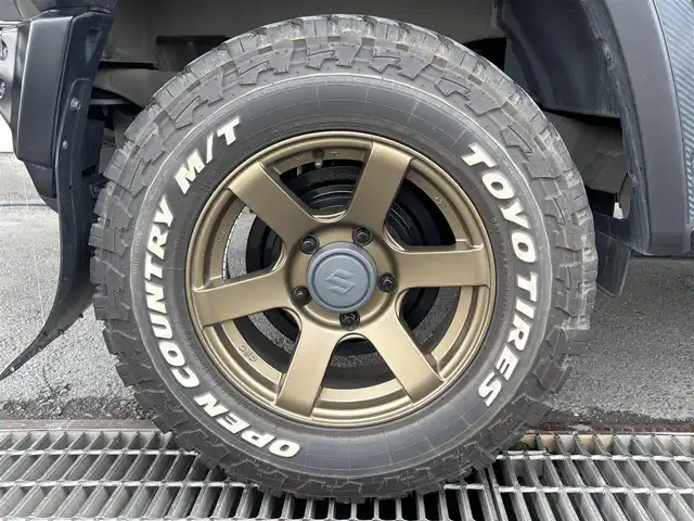 スズキ ジムニー シエラ JC 東京都 2020(令2)年 4.5万km ジャングルグリーン ４ＷＤ/セーフティサポート（予防安全技術）/アルパインナビ/バックカメラ/クルーズコントロール/ドライブレコーダー/ヒルディセントコントロール/LEDヘッドランプ/オートライト/ヘッドランプウォッシャー/ブラックドアミラー（電動オート格納機能/ヒーター/ウィンカー付）/ボディ同色アウトサイドドアハンドル/プライバシーガラス/アナログメーター/ホワイト照明マルチインフォメーションディスプレイ/革巻きステアリングホイール/ステアリングスイッチ/SRSエアバック  （運転席/助手席）/バニティミラー（運転席/助手席）/撥水加工ファブリックシート/シートヒーター（運転席/助手席）/キーレスプッシュスタートシステム/タクティカルＲバンパー/ナンバー移動キット/オーバーフェンダープロテクター/ヒッチキャリア/ルーフキャリア