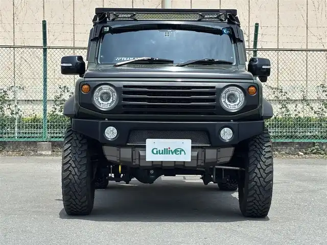 スズキ ジムニー シエラ JC 東京都 2020(令2)年 4.5万km ジャングルグリーン ４ＷＤ/セーフティサポート（予防安全技術）/アルパインナビ/バックカメラ/クルーズコントロール/ドライブレコーダー/ヒルディセントコントロール/LEDヘッドランプ/オートライト/ヘッドランプウォッシャー/ブラックドアミラー（電動オート格納機能/ヒーター/ウィンカー付）/ボディ同色アウトサイドドアハンドル/プライバシーガラス/アナログメーター/ホワイト照明マルチインフォメーションディスプレイ/革巻きステアリングホイール/ステアリングスイッチ/SRSエアバック  （運転席/助手席）/バニティミラー（運転席/助手席）/撥水加工ファブリックシート/シートヒーター（運転席/助手席）/キーレスプッシュスタートシステム/タクティカルＲバンパー/ナンバー移動キット/オーバーフェンダープロテクター/ヒッチキャリア/ルーフキャリア