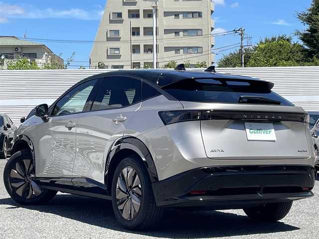 日産 アリア B6 e－4ORCE リミテッド 東京都 2023(令5)年 0.7万km ゴールド 車体色　XGJ　暁サンライズカッパー×ミッドナイトブラック/ワンオーナー/プロパイロット2.0/純正ディスプレイオーディオ/（ナビ/フルセグ/BT/HDMI/AppleCarplay）/BOSEサウンド/全方位カメラ ETC2.0/デジタルインナーミラー/ドライブレコーダー/ブラインドスポットモニター/レザーシート　パノラミックガラスルーフ/シートヒーター（全席）/パワーシート（D/N）/エアーシート（D/N）/パワーバックドア/コーナーセンサー/スペアキー×2/純正19インチアルミ/登録時走行距離【6711km】