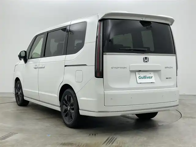 ホンダ ステップワゴン スパーダ eHEV 岡山県 2025(令7)年 0.1千km プラチナホワイトパール 登録済未使用車/純正11.4インチナビ/・FM/AM/Bluetooth/フルセグ/CD/DVD/CarPlay/15.6インチ後席モニター/ハーフレザーシート/・シートヒーター/パワーバックドア/ホンダセンシング/・衝突軽減ブレーキ/・車線逸脱警報/車線維持支援システム/・アダプティブクルーズコントロール/・コーナーセンサー/両側パワースライドドア/2列目オットマン/パドルシフト/オートブレーキホールド/ダブルエアコン/純正16インチアルミ