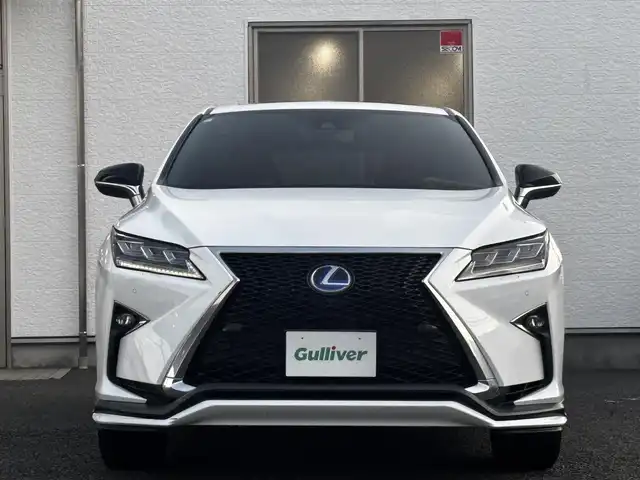 レクサス ＲＸ 450h Fスポーツ 熊本県 2018(平30)年 8.6万km ホワイトノーヴァガラスフレーク サンルーフ/純正ナビ/【フルセグTV/CD/DVD/Bluetooth】/パノラミックビューモニター/バックカメラ/レーダークルーズコントロール/衝突被害軽減ブレーキ/レーンキープアシスト/ヘッドアップディスプレイ/コーナーセンサー/赤革シート/パワーシート/シートヒーター/エアシート/純正20インチAW/置くだけ充電/電動パーキング/ビルトインETC2.0/オートLEDヘッドライト/ウィンカーミラー/プッシュスタート/ステアリングスイッチ/純正フロアマット/横滑り防止/盗難防止装置/取扱説明書