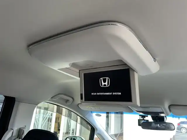 ホンダ オデッセイ ハイブリッド アブソルートセンシングEXパック 静岡県 2016(平28)年 7.4万km ホワイトオーキッドパール ホンダセンシング/1.衝突軽減ブレーキ/2.誤発進抑制機能/3.歩行者事故低減ステアリング/4.路外逸脱抑制機能/5.アダプティブクルーズコントロール/6.車線維持支援システム/7.先行車発進お知らせ機能/8.標識認識機能/9.後方誤発進抑制機能/10.近距離衝軽減ブレーキ/11.オートハイビーム/12.アダプティブドライビングビーム（車速可変照明角度）/13トラフィックジャムアシスト（渋滞運転支援機能）/純正8インチナビ/FM/AM/CD/DVD/Bluetooth/iPod/レーダークルーズコントロール/フリップダウンモニター/両側パワースライドドア/全周囲カメラ/ビルトインETC/前後ドラレコ/ハーフレザーシート/オットマン/ウォークスルー/オートライト