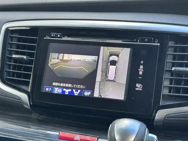 ホンダ オデッセイ ハイブリッド アブソルートセンシングEXパック 静岡県 2016(平28)年 7.4万km ホワイトオーキッドパール ホンダセンシング/1.衝突軽減ブレーキ/2.誤発進抑制機能/3.歩行者事故低減ステアリング/4.路外逸脱抑制機能/5.アダプティブクルーズコントロール/6.車線維持支援システム/7.先行車発進お知らせ機能/8.標識認識機能/9.後方誤発進抑制機能/10.近距離衝軽減ブレーキ/11.オートハイビーム/12.アダプティブドライビングビーム（車速可変照明角度）/13トラフィックジャムアシスト（渋滞運転支援機能）/純正8インチナビ/FM/AM/CD/DVD/Bluetooth/iPod/レーダークルーズコントロール/フリップダウンモニター/両側パワースライドドア/全周囲カメラ/ビルトインETC/前後ドラレコ/ハーフレザーシート/オットマン/ウォークスルー/オートライト