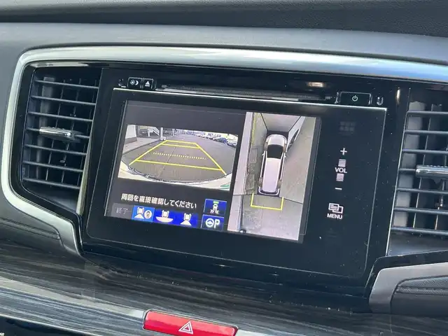 ホンダ オデッセイ ハイブリッド アブソルートセンシングEXパック 静岡県 2016(平28)年 7.4万km ホワイトオーキッドパール ホンダセンシング/1.衝突軽減ブレーキ/2.誤発進抑制機能/3.歩行者事故低減ステアリング/4.路外逸脱抑制機能/5.アダプティブクルーズコントロール/6.車線維持支援システム/7.先行車発進お知らせ機能/8.標識認識機能/9.後方誤発進抑制機能/10.近距離衝軽減ブレーキ/11.オートハイビーム/12.アダプティブドライビングビーム（車速可変照明角度）/13トラフィックジャムアシスト（渋滞運転支援機能）/純正8インチナビ/FM/AM/CD/DVD/Bluetooth/iPod/レーダークルーズコントロール/フリップダウンモニター/両側パワースライドドア/全周囲カメラ/ビルトインETC/前後ドラレコ/ハーフレザーシート/オットマン/ウォークスルー/オートライト