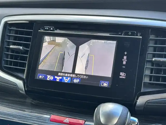 ホンダ オデッセイ ハイブリッド アブソルートセンシングEXパック 静岡県 2016(平28)年 7.4万km ホワイトオーキッドパール ホンダセンシング/1.衝突軽減ブレーキ/2.誤発進抑制機能/3.歩行者事故低減ステアリング/4.路外逸脱抑制機能/5.アダプティブクルーズコントロール/6.車線維持支援システム/7.先行車発進お知らせ機能/8.標識認識機能/9.後方誤発進抑制機能/10.近距離衝軽減ブレーキ/11.オートハイビーム/12.アダプティブドライビングビーム（車速可変照明角度）/13トラフィックジャムアシスト（渋滞運転支援機能）/純正8インチナビ/FM/AM/CD/DVD/Bluetooth/iPod/レーダークルーズコントロール/フリップダウンモニター/両側パワースライドドア/全周囲カメラ/ビルトインETC/前後ドラレコ/ハーフレザーシート/オットマン/ウォークスルー/オートライト