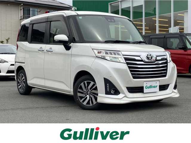 トヨタ ルーミー カスタムG 静岡県 2020(令2)年 4.5万km パールホワイトⅢ エンジンスタートボタン/スマートキー/スペアキー１本/パワーステアリング/パワーウィンドウ/オートエアコン/オートライト/オートマチックハイビーム/LEDヘッドライト/クルーズコントロール有/純正ETC2.0/純正フロアマット/純正アルミホイール/純正SDナビ（CD、DVD、BT、フルセグ）/コーナーセンサー前後/全方位カメラ/横滑り防止装置/衝突軽減システム/Wエアバック/D+N席シートヒーター/両側パワースライドドア/アイドリングスストップ/取扱説明書