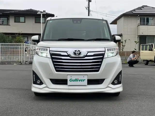 トヨタ ルーミー カスタムG 静岡県 2020(令2)年 4.5万km パールホワイトⅢ エンジンスタートボタン/スマートキー/スペアキー１本/パワーステアリング/パワーウィンドウ/オートエアコン/オートライト/オートマチックハイビーム/LEDヘッドライト/クルーズコントロール有/純正ETC2.0/純正フロアマット/純正アルミホイール/純正SDナビ（CD、DVD、BT、フルセグ）/コーナーセンサー前後/全方位カメラ/横滑り防止装置/衝突軽減システム/Wエアバック/D+N席シートヒーター/両側パワースライドドア/アイドリングスストップ/取扱説明書