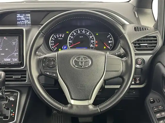トヨタ ヴォクシー ZS 煌 埼玉県 2015(平27)年 6.4万km ブラッキッシュアゲハガラスフレーク 純正9インチSDナビ　NSZT-Y64T/(AM/FM/CD/DVD/TV/BT)/フリップダウンモニター V11T-R62C/両側パワースライドドア/バックカメラ/オートライト/LEDヘッドライト/ビルドインETC/プッシュスタート/スマートキー/純正16インチアルミホイール/純正フロアマット/ウォークスルー/ドアバイザー/電格ミラー