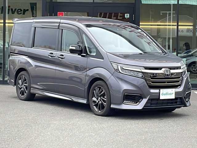 ホンダ ステップワゴン スパーダクールスピリット HセンシングBスタイル 鹿児島県 2019(令1)年 5.3万km モダンスティールM 純正ナビ/FM　AM　CD　DVD　Bluetooth　HDMI　USB/フルセグTV/後席モニター/プッシュスタート/パワーステアリング/パワーウィンドウ/アイドリングストップ/スマートキー/WAC/追従ありクルーズコントロール/ETC2.0/バックカメラ/アラウンドビューカメラ/ウォークスルー/3列シート/両側パワースライドドア/横滑り防止装置/レーンキープアシスト/盗難防止装置/オートライト/LEDライト/カーテンエアバッグ/3列シート/衝突被害軽減ブレーキ