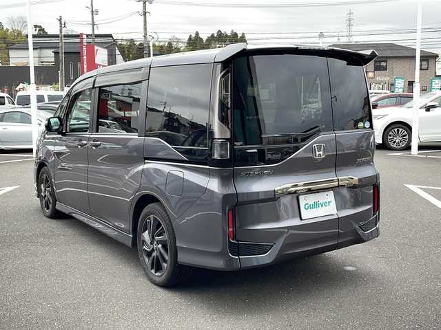 ホンダ ステップワゴン スパーダクールスピリット HセンシングBスタイル 鹿児島県 2019(令1)年 5.3万km モダンスティールM 純正ナビ/FM　AM　CD　DVD　Bluetooth　HDMI　USB/フルセグTV/後席モニター/プッシュスタート/パワーステアリング/パワーウィンドウ/アイドリングストップ/スマートキー/WAC/追従ありクルーズコントロール/ETC2.0/バックカメラ/アラウンドビューカメラ/ウォークスルー/3列シート/両側パワースライドドア/横滑り防止装置/レーンキープアシスト/盗難防止装置/オートライト/LEDライト/カーテンエアバッグ/3列シート/衝突被害軽減ブレーキ