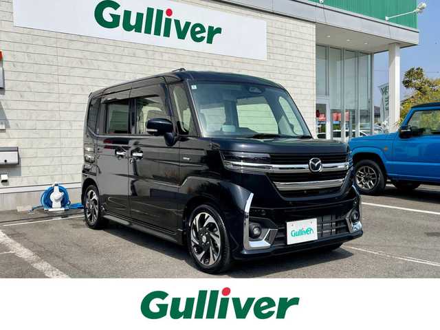 マツダ フレアワゴン カスタムスタイル XT 神奈川県 2024(令6)年 0.3万km ブルーイッシュブラックパール3 ワンオーナー/純正9インチHDナビ/　・バックカメラ/全方位カメラ/　・フルセグTV/AppleCarPlay/AndroidAuto/BT/運転支援装置/　・デュアルセンサーブレーキサポートII/　・誤発進抑制機能/　・車線逸脱抑制機能/　・車線維持支援機能/　・発進お知らせ機能/　・ハイビームアシスト/　・標識認識機能/　・アダプティブクルーズコントロール/　・パーキングセンサー/　・低速時ブレーキサポート（前進/後退）/　・後方誤発進抑制機能/　・ヘッドアップディスプレイ/両側パワースライドドア/ステアリングヒーター/パドルシフト/前席シートヒーター/純正15インチAW/エアロバンパー/サイドアンダースポイラー/保証継承可/ビルトインETC/スマートキー×２/取扱説明書/整備記録簿