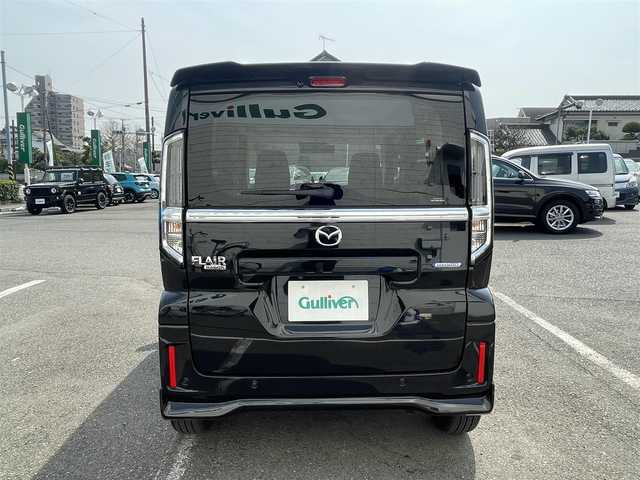 マツダ フレアワゴン カスタムスタイル XT 神奈川県 2024(令6)年 0.3万km ブルーイッシュブラックパール3 ワンオーナー/純正9インチHDナビ/　・バックカメラ/全方位カメラ/　・フルセグTV/AppleCarPlay/AndroidAuto/BT/運転支援装置/　・デュアルセンサーブレーキサポートII/　・誤発進抑制機能/　・車線逸脱抑制機能/　・車線維持支援機能/　・発進お知らせ機能/　・ハイビームアシスト/　・標識認識機能/　・アダプティブクルーズコントロール/　・パーキングセンサー/　・低速時ブレーキサポート（前進/後退）/　・後方誤発進抑制機能/　・ヘッドアップディスプレイ/両側パワースライドドア/ステアリングヒーター/パドルシフト/前席シートヒーター/純正15インチAW/エアロバンパー/サイドアンダースポイラー/保証継承可/ビルトインETC/スマートキー×２/取扱説明書/整備記録簿