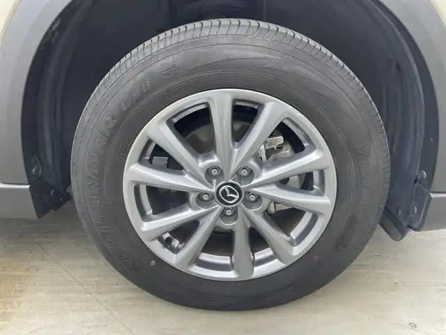 マツダ ＣＸ－５ XD プロアクティブ 岡山県 2022(令4)年 4.5万km ジルコンサンドメタリック 純正１０．２５インチメモリナビゲーション		/【フルセグ/Bluetooth/CarPlay】		/３６０°カメラ		/純正17inアルミホイール+サマータイヤ：装着			/レーダークルーズコントロール		/ETC		/電動リアゲート/パワーシート/シートメモリー/LEDヘッドライト（AUTO機能付き）/ハイビームアシスト		/シートヒーター	/ステリングヒーター	/横滑り防止機能		/衝突軽減システム		/車線逸脱防止システム			/ブラインドスポットモニター	/ステアリングスイッチ		/プッシュスタート		/コーナーセンサー				/フロアマット				/取扱説明書		/スペアキー×１	/新車保証書