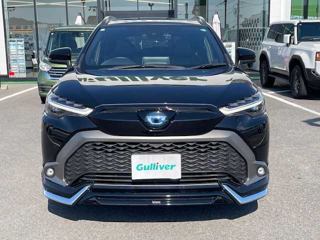 トヨタ カローラ クロス ハイブリッド Z 長崎県 2023(令5)年 1.2万km アティチュードブラックマイカ 純正メーカーナビ/BT/Mira cast/USB/バックカメラ/ムーンルーフ/モデリスタエアロ/ハーフレザーシート/D席パワーシート/前席シートヒーター/トヨタセーフティセンス/レーダークルーズコントロール/レーンキープアシスト/ステアリングスイッチ/オートマチックハイビーム/LEDヘッドライト/パワーバックドア/ドライブレコーダー/ビルトインETC