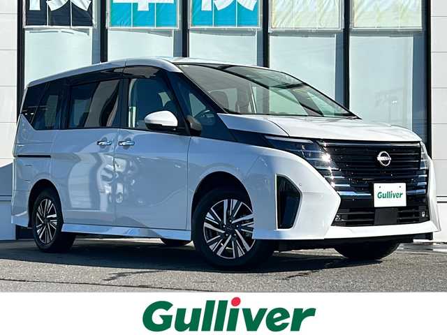 日産 セレナ ハイウェイスター V 山形県 2023(令5)年 2.7万km プリズムホワイト 禁煙車/４WD/プロパイロット/ブラインドスポットモニター/横滑り防止装置/レーンキープアシスト/全方位カメラ/デジタルインナーミラー/オートマチックハイビーム/純正ナビ/（Bluetooth/フルセグ/AM/FM/AppleCarPlay)/フリップダウンモニター/置くだけ充電/アイドリングストップ/ステアリングスイッチ/パドルシフト/ステアリングヒーター/両側パワースライドドア/前席・２列目シートヒーター/ETC2.0/電動格納ミラー/ドアバイザー/純正アルミホイール