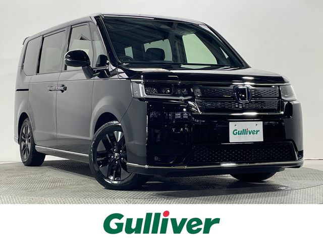 ホンダ ステップワゴン スパーダ eHEV 大阪府 2025(令7)年 0.1千km クリスタルブラックパール 11.4インチナビ　バックカメラ　Bluetooth　フルセグTV DVD再生　ホンダセンシング　レーダークルーズコントロール　電動リアゲート　両側パワースライドドア　シートヒーター　BSM オートライト　LEDヘッドライト　スマートキー2本
