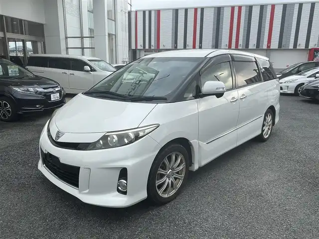 トヨタ エスティマ 宮崎県 2014(平26)年 13.7万km ホワイトパールクリスタルシャイン /ワンセグテレビ//バックカメラ//フリップダウンモニター//オットマン//両側パワースライドドア//プッシュスタート//ETC//前後ドラレコ//取扱説明書