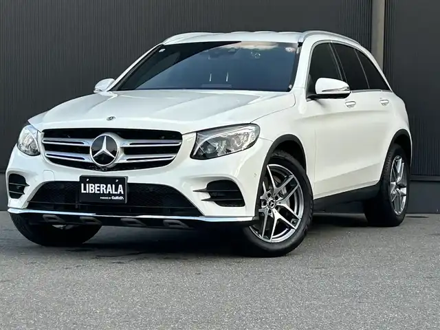 メルセデス・ベンツ ＧＬＣ２２０ d 4マチックスポーツ 香川県 2018(平30)年 5.1万km ポーラホワイト 登録時走行距離：51010km/純正ナビ/→BT/DVD/→フルセグTV/アラウンドビューモニター/バックカメラ/アダプティブクルーズコントロール/ブラインドスポットモニター/レーンキープアシスト/ヘッドアップディスプレイ/パワーシート/シートヒーター/パワーバックドア/ETC/ドライブレコーダー/革巻きステアリング/ステアリングリモコン/ハーフレザーシート/LEDヘッドライト/USB入力端子/純正フロアマット/純正19インチアルミホイール