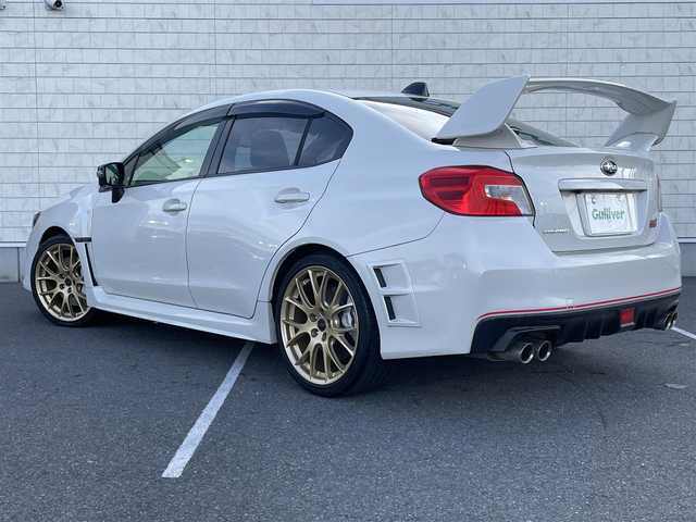 スバル ＷＲＸ ＳＴＩ EJ20 Final edition full package 栃木県 2020(令2)年 4.9万km クリスタルホワイトP 555台限定車/ワンオーナー /禁煙車/純正BBS製7本Y字スポークゴールド塗装アルミホイール/STiフロント/サイドアンダースポイラー/brembo製18インチブレーキ(フロント対向6ポッド/リア対向2ポッド)/「STi」ロゴ入シルバー塗装キャリパー/ブラックドアミラー(LED式ウインカー付)/「STi」エンブレム付ブラックサイドガーニッシュ//サイドシルスポイラー/大型ウイングタイプリアスポイラー/LEDヘッドランプ/・オートライト/ハイビームアシスト/OPフルパッケージ/・リアビークルディテクション/・フロント/サイドビューモニター/・ハイビームアシスト/・ウェルカムライティング/・RECARO製フロントシート/A2Mプロテクトカーセキュリティあり/純正8インチメモリナビ ・フルセグTV/・DVD/BD再生可/・Bluetooth/バックカメラ/前席パワーシート/シートヒーター/ハーフレザーシート/ETC2.0/純正ドラレコ/プッシュエンジンスタート/スマートキー×2/新車時保証書/取扱説明書