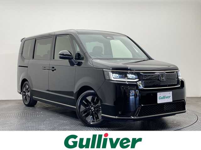 ホンダ ステップワゴン スパーダ eHEV 愛媛県 2025(令7)年 0.1千km クリスタルブラックパール １１．４型ナビ/フルセグ／Ｂｌｕｅｔｏｏｔｈ／ＵＳＢ/バックカメラ/衝突軽減ブレーキ/レーダークルーズコントロール/両側パワースライドドア/パワーバックドア/ＤＮ席シートヒーター/レーンキープアシスト/前後コーナーセンサー/ブラインドスポットモニター