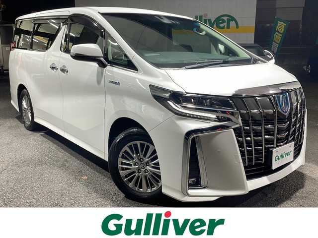トヨタ アルファードハイブリット SR Cパッケージ 東京都 2019(令1)年 4.4万km ホワイトパールクリスタルシャイン ワンオーナー/純正メモリナビ（ＮＳＺＮ－Ｚ６８Ｔ）/フルタイム４ＷＤ/ビルトイン2.0ETC/純正アルミホイール/フルセグテレビ/バックカメラ/両側パワースライドドア/後席フリップダウンモニター/プッシュスタート/Bluetooth接続/ブレーキホールド/電動パーキングブレーキ/電動格納ミラー/パワーゲート/デジタルインナーミラー/ドライブレコーダー/シートヒーター/エアシート/オートマチックハイビーム/オートライト/盗難防止装置/横滑り防止装置/１５００W/100V充電/クルーズコントロール/LEDヘッドライト/カーテンエアバッグ/レーンアシスト/コーナーセンサー