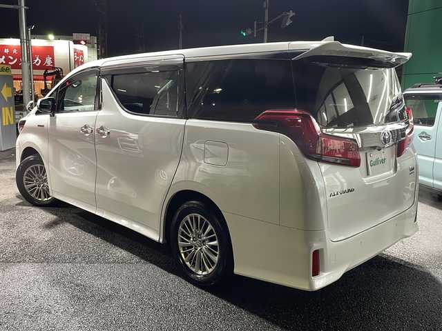 トヨタ アルファードハイブリット SR Cパッケージ 東京都 2019(令1)年 4.4万km ホワイトパールクリスタルシャイン ワンオーナー/純正メモリナビ（ＮＳＺＮ－Ｚ６８Ｔ）/フルタイム４ＷＤ/ビルトイン2.0ETC/純正アルミホイール/フルセグテレビ/バックカメラ/両側パワースライドドア/後席フリップダウンモニター/プッシュスタート/Bluetooth接続/ブレーキホールド/電動パーキングブレーキ/電動格納ミラー/パワーゲート/デジタルインナーミラー/ドライブレコーダー/シートヒーター/エアシート/オートマチックハイビーム/オートライト/盗難防止装置/横滑り防止装置/１５００W/100V充電/クルーズコントロール/LEDヘッドライト/カーテンエアバッグ/レーンアシスト/コーナーセンサー