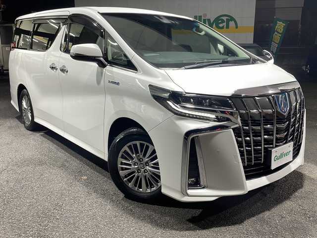 トヨタ アルファードハイブリット SR Cパッケージ 東京都 2019(令1)年 4.4万km ホワイトパールクリスタルシャイン ワンオーナー/純正メモリナビ（ＮＳＺＮ－Ｚ６８Ｔ）/フルタイム４ＷＤ/ビルトイン2.0ETC/純正アルミホイール/フルセグテレビ/バックカメラ/両側パワースライドドア/後席フリップダウンモニター/プッシュスタート/Bluetooth接続/ブレーキホールド/電動パーキングブレーキ/電動格納ミラー/パワーゲート/デジタルインナーミラー/ドライブレコーダー/シートヒーター/エアシート/オートマチックハイビーム/オートライト/盗難防止装置/横滑り防止装置/１５００W/100V充電/クルーズコントロール/LEDヘッドライト/カーテンエアバッグ/レーンアシスト/コーナーセンサー