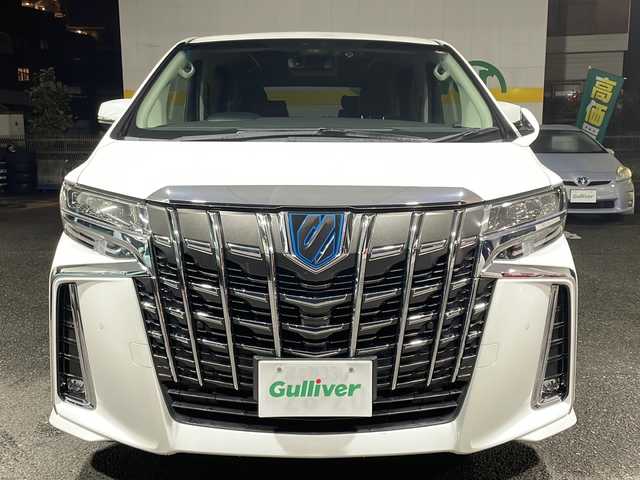 トヨタ アルファードハイブリット SR Cパッケージ 東京都 2019(令1)年 4.4万km ホワイトパールクリスタルシャイン ワンオーナー/純正メモリナビ（ＮＳＺＮ－Ｚ６８Ｔ）/フルタイム４ＷＤ/ビルトイン2.0ETC/純正アルミホイール/フルセグテレビ/バックカメラ/両側パワースライドドア/後席フリップダウンモニター/プッシュスタート/Bluetooth接続/ブレーキホールド/電動パーキングブレーキ/電動格納ミラー/パワーゲート/デジタルインナーミラー/ドライブレコーダー/シートヒーター/エアシート/オートマチックハイビーム/オートライト/盗難防止装置/横滑り防止装置/１５００W/100V充電/クルーズコントロール/LEDヘッドライト/カーテンエアバッグ/レーンアシスト/コーナーセンサー