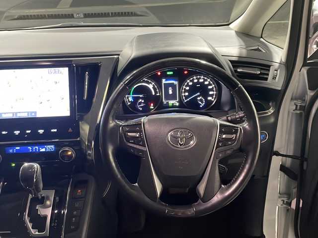 トヨタ アルファードハイブリット SR Cパッケージ 東京都 2019(令1)年 4.4万km ホワイトパールクリスタルシャイン ワンオーナー/純正メモリナビ（ＮＳＺＮ－Ｚ６８Ｔ）/フルタイム４ＷＤ/ビルトイン2.0ETC/純正アルミホイール/フルセグテレビ/バックカメラ/両側パワースライドドア/後席フリップダウンモニター/プッシュスタート/Bluetooth接続/ブレーキホールド/電動パーキングブレーキ/電動格納ミラー/パワーゲート/デジタルインナーミラー/ドライブレコーダー/シートヒーター/エアシート/オートマチックハイビーム/オートライト/盗難防止装置/横滑り防止装置/１５００W/100V充電/クルーズコントロール/LEDヘッドライト/カーテンエアバッグ/レーンアシスト/コーナーセンサー