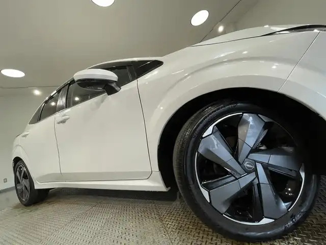 日産 オーラ G 愛知県 2022(令4)年 4.3万km ピュアホワイトパール 純正９インチナビ/プロパイロット/アラウンドビューモニター/ＢＯＳＥサウンドシステム/寒冷地仕様/衝突軽減ブレーキ/車線逸脱警報/ブラインドスポットモニター/クリアランスソナー/ワイヤレス充電/ハンドルヒーター/シートヒーター/ハーフレザーシート/デジタルインナーミラー/ビルトインＥＴＣ2.0/USB＆HDMI入力端子/ISOFIX/純正17インチアルミホイール