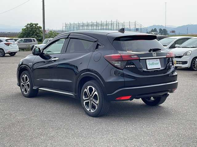 ホンダ ヴェゼル ハイブリッド Z ホンダセンシング 新潟県 2021(令3)年 5.9万km クリスタルブラックパール 4WD/純正メモリナビ(VXM-207VFEi)/CD/DVD/BT/フルセグテレビ/SDミュージックサーバー/バックカメラ/ETC/ドライブレコーダー/衝突被害軽減ブレーキ/レーンキープアシスト/レーダークルーズコントロール/半革シート/シートヒーター /パドルシフト/ステアリングスイッチ/スマートキー/プッシュスタート/LEDヘッドライト/オートライト/フォグランプ/純正17インチアルミホイール/社外16インチAW冬タイヤ車載