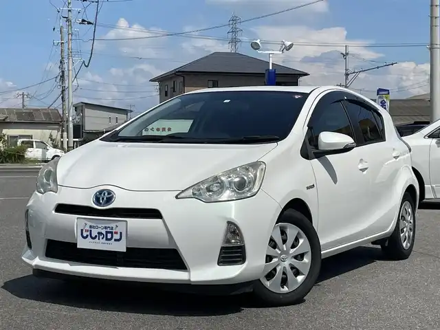 トヨタ アクア G 佐賀県 2012(平24)年 9.4万km ライムホワイトパールクリスタルシャイン （株)IDOMが運営する【じしゃロン佐賀店】の自社ローン専用車両になります。/こちらは現金またはオートローンご利用時の価格です。自社ローンご希望の方は別途その旨お申付け下さい/禁煙車　/ライムホワイトパール　/スマートエントリー　　/純正ナビ／フルセグＴＶ／ＢＴオーディオ　/ＥＴＣ