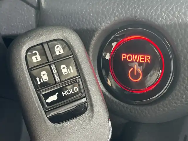ホンダ ステップワゴン スパーダ eHEV 福岡県 2025(令7)年 0.1千km クリスタルブラックパール 登録済み未使用車純正11型メモリナビ(フルセグTV/DVD/CD/BT)バックモニターホンダセンシングシートヒーターレーダークルコン両側パワスラコーナーセンサーオートブレーキホールドUSBポート電動リアゲート