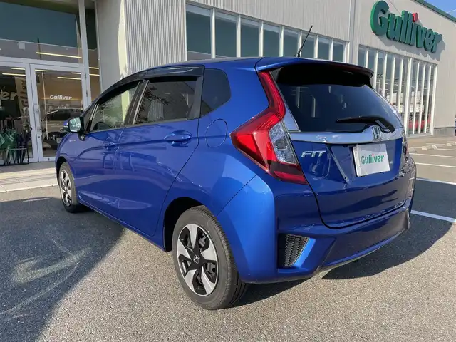 ホンダ フィット ハイブリット Lパッケージ 石川県 2016(平28)年 9.7万km 青 社外メモリーナビ/社外CD/DVD/フルセグTV/バックカメラ/ETC/スマートキー/プッシュスタート/電動ミラー/クルーズコントロール/ハーフレザーシート