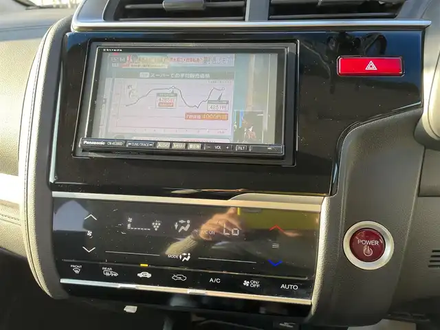 ホンダ フィット ハイブリット Lパッケージ 石川県 2016(平28)年 9.7万km 青 社外メモリーナビ/社外CD/DVD/フルセグTV/バックカメラ/ETC/スマートキー/プッシュスタート/電動ミラー/クルーズコントロール/ハーフレザーシート