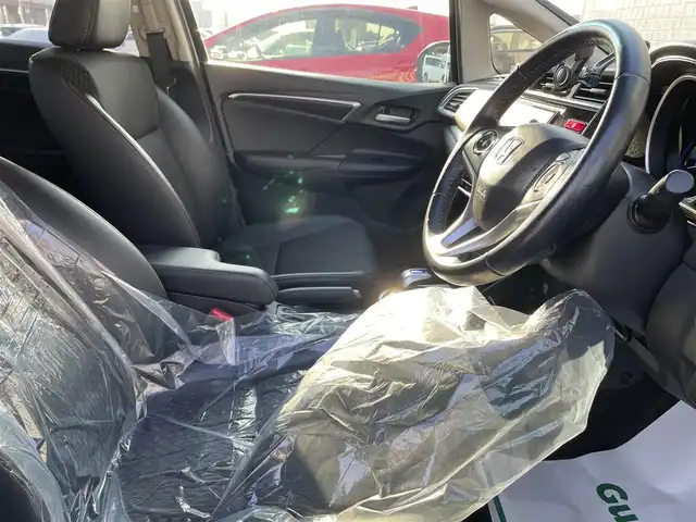 ホンダ フィット ハイブリット Lパッケージ 石川県 2016(平28)年 9.7万km 青 社外メモリーナビ/社外CD/DVD/フルセグTV/バックカメラ/ETC/スマートキー/プッシュスタート/電動ミラー/クルーズコントロール/ハーフレザーシート