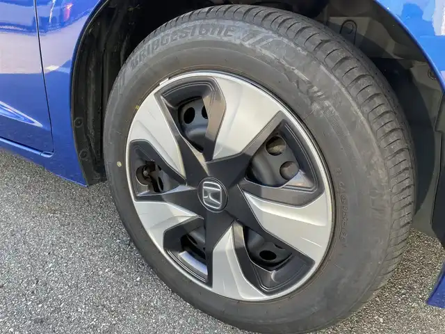 ホンダ フィット ハイブリット Lパッケージ 石川県 2016(平28)年 9.7万km 青 社外メモリーナビ/社外CD/DVD/フルセグTV/バックカメラ/ETC/スマートキー/プッシュスタート/電動ミラー/クルーズコントロール/ハーフレザーシート