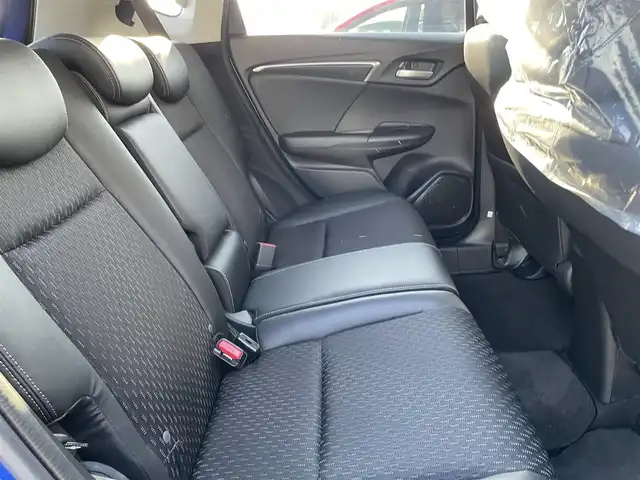 ホンダ フィット ハイブリット Lパッケージ 石川県 2016(平28)年 9.7万km 青 社外メモリーナビ/社外CD/DVD/フルセグTV/バックカメラ/ETC/スマートキー/プッシュスタート/電動ミラー/クルーズコントロール/ハーフレザーシート