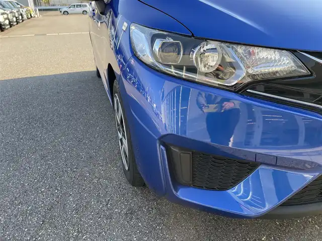 ホンダ フィット ハイブリット Lパッケージ 石川県 2016(平28)年 9.7万km 青 社外メモリーナビ/社外CD/DVD/フルセグTV/バックカメラ/ETC/スマートキー/プッシュスタート/電動ミラー/クルーズコントロール/ハーフレザーシート