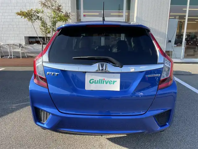 ホンダ フィット ハイブリット Lパッケージ 石川県 2016(平28)年 9.7万km 青 社外メモリーナビ/社外CD/DVD/フルセグTV/バックカメラ/ETC/スマートキー/プッシュスタート/電動ミラー/クルーズコントロール/ハーフレザーシート