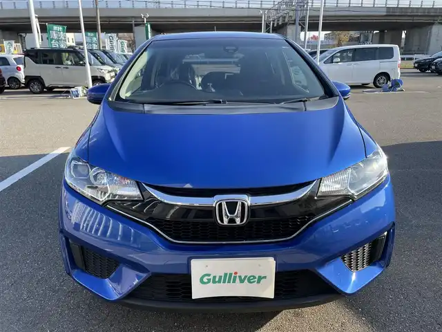 ホンダ フィット ハイブリット Lパッケージ 石川県 2016(平28)年 9.7万km 青 社外メモリーナビ/社外CD/DVD/フルセグTV/バックカメラ/ETC/スマートキー/プッシュスタート/電動ミラー/クルーズコントロール/ハーフレザーシート