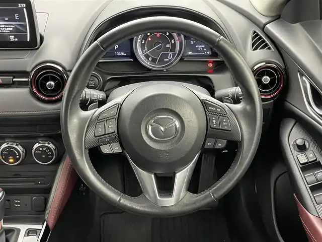 マツダ ＣＸ－３ 岡山県 2015(平27)年 7.7万km セラミックM 純正ナビ/・FM/AM/Bluetooth/フルセグ/CD/DVD/バックカメラ/衝突軽減ブレーキ/レーンキープアシスト/レーダークルーズコントロール/ETC/HUD/LEDヘッドライト/パドルシフト/純正18インチアルミ/純正フロアマット/スマートキー/アイドリングストップ