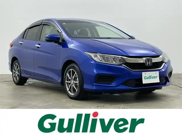 ホンダ グレイス LX 岡山県 2019(平31)年 2.7万km ブリリアントスポーティブルーメタリック 純正8インチナビ/【Bluetooth/フルセグTV/CD/DVD】/型番:VXM-195VFEi/バックカメラ/衝突軽減ブレーキシステム/LEDヘッドライト/ビルトインETC/オートハイビーム/オートライト/レーダークルーズコントロール/モデューロ15インチアルミホイール/プッシュスタート/アイドリングストップ/ワンオーナー/新車保証書/取扱説明書