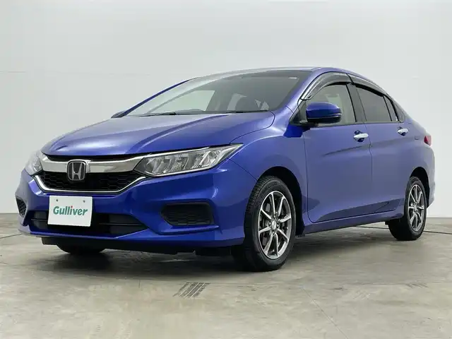 ホンダ グレイス LX 岡山県 2019(平31)年 2.7万km ブリリアントスポーティブルーメタリック 純正8インチナビ/【Bluetooth/フルセグTV/CD/DVD】/型番:VXM-195VFEi/バックカメラ/衝突軽減ブレーキシステム/LEDヘッドライト/ビルトインETC/オートハイビーム/オートライト/レーダークルーズコントロール/モデューロ15インチアルミホイール/プッシュスタート/アイドリングストップ/ワンオーナー/新車保証書/取扱説明書