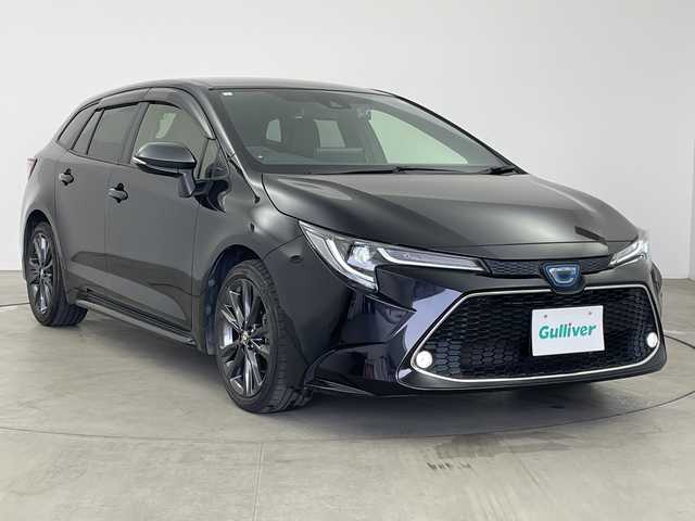 トヨタ カローラツーリング ハイブリッド ダブルバイビー 愛知県 2021(令3)年 3.6万km スパークリングブラックパールクリスタルシャイン ワンオーナー/純正９インチディスプレイオーディオ/（AM/FM/Bluetooth/フルセグTV/USB)/バックカメラ/トヨタセーフティセンス/・プリクラッシュセーフティ/・レーダークルーズコントロール/・オートマチックハイビーム/・レーンディパーチャーアラート/・パーキングセンサー/前後ドライブレコーダー/ETC/純正１７インチアルミホイール/LEDヘッドライト/LEDフォグランプ/横滑り防止装置/オートライト/純正フロアマット/レーダー探知機（ZERO 702V）/スペアタイヤ