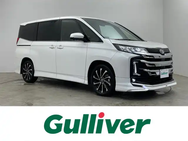 トヨタ ノア ハイブリッド S－Z 埼玉県 2024(令6)年 3.2万km ホワイトパールクリスタルシャイン モデリスタエアロ/純正１０．５インチディスプレイオーディオ/フルセグTV/CD/DVD/Bluetooth/HDMI/１３．２インチフリップダウンモニター/パノラミックビューモニター/ＢＳＭ/ビルトインＥＴＣ２．０/トヨタチームメイト/レーダークルーズコントロール/シートヒーター/AC100V/パーキングアシスト/両側パワースライドドア/純正アルミホイール/オートハイビーム/ＬＥＤヘッドライト