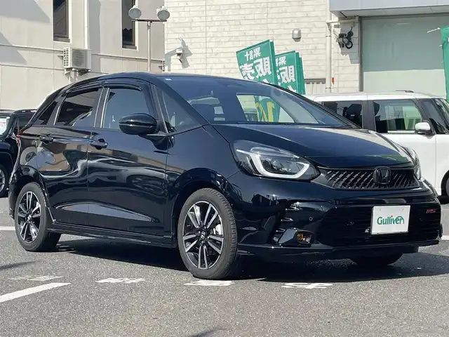 ホンダ フィット e:HEV RS 岡山県 2025(令7)年 0.8万km クリスタルブラックパール 登録時走行距離7288km/純正HDDナビ/(AM/FM/BT/DVD/Apple Car Play)/ホンダセンシング/ビルトインETC/ドライブレコーダー前方/フルセグTV/バックカメラ/コーナーセンサー前後/オートライト/衝突被害軽減システム/レーンキープアシスト/クルーズコントロール/アイドリングストップ/横滑り防止装置/盗難防止装置/ABS/パドルシフト/スマートキー/スペアキー1本/保証書/取扱説明書/記録簿